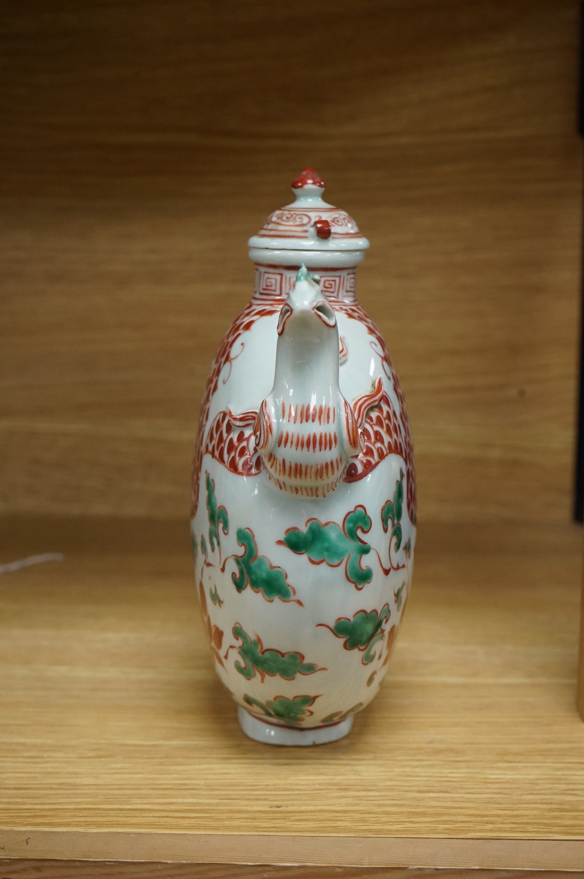 A Chinese famille verte ‘phoenix’ wine pot and cover, 20cm